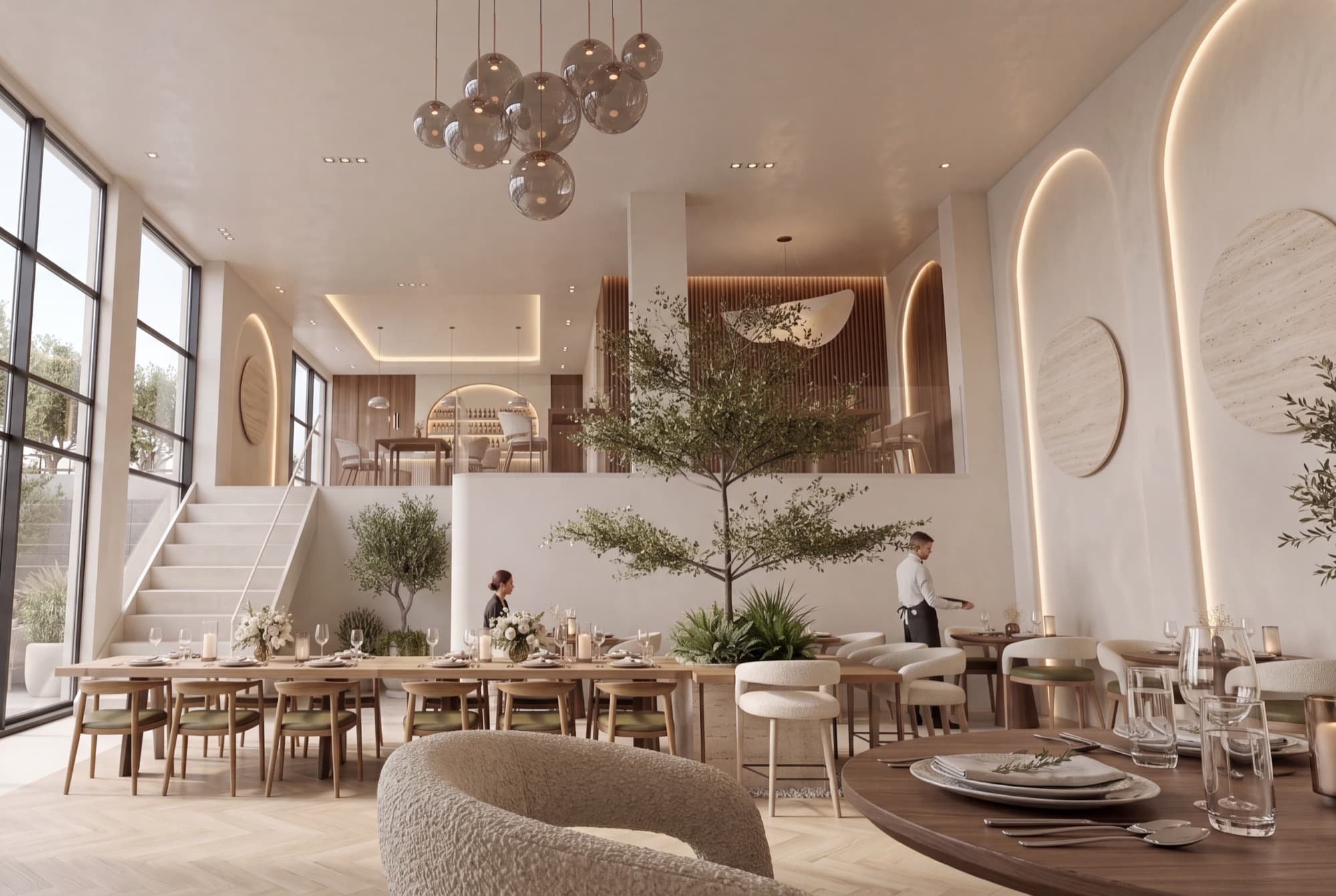 Main dining hall with double-height ceiling, glass chandeliers and olive trees