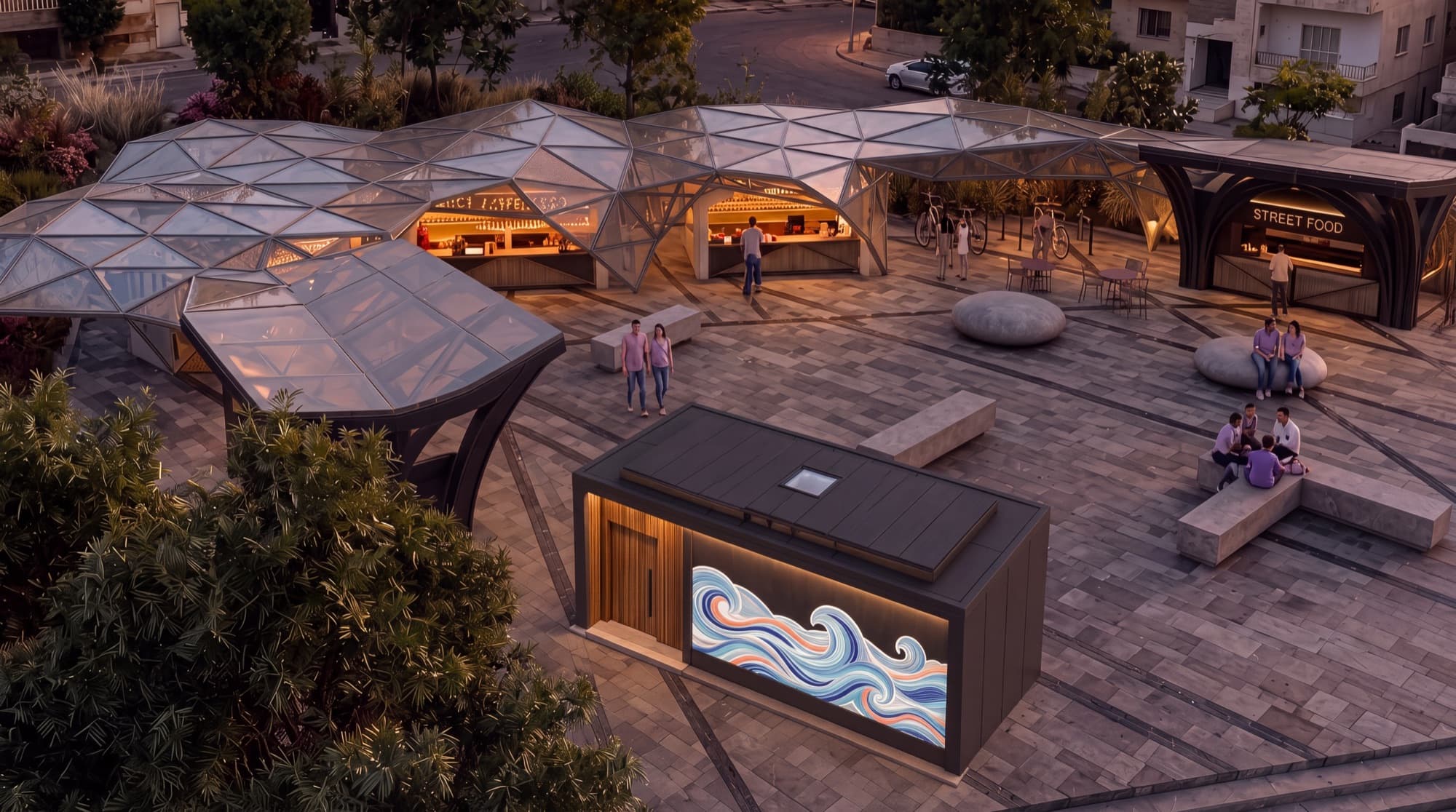 Glass canopies and a mural-clad container kiosk on the plaza